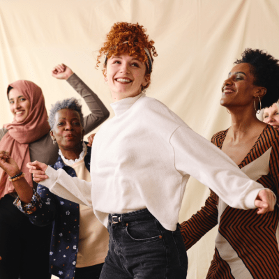 Women dancing for somatic movement classes and groups